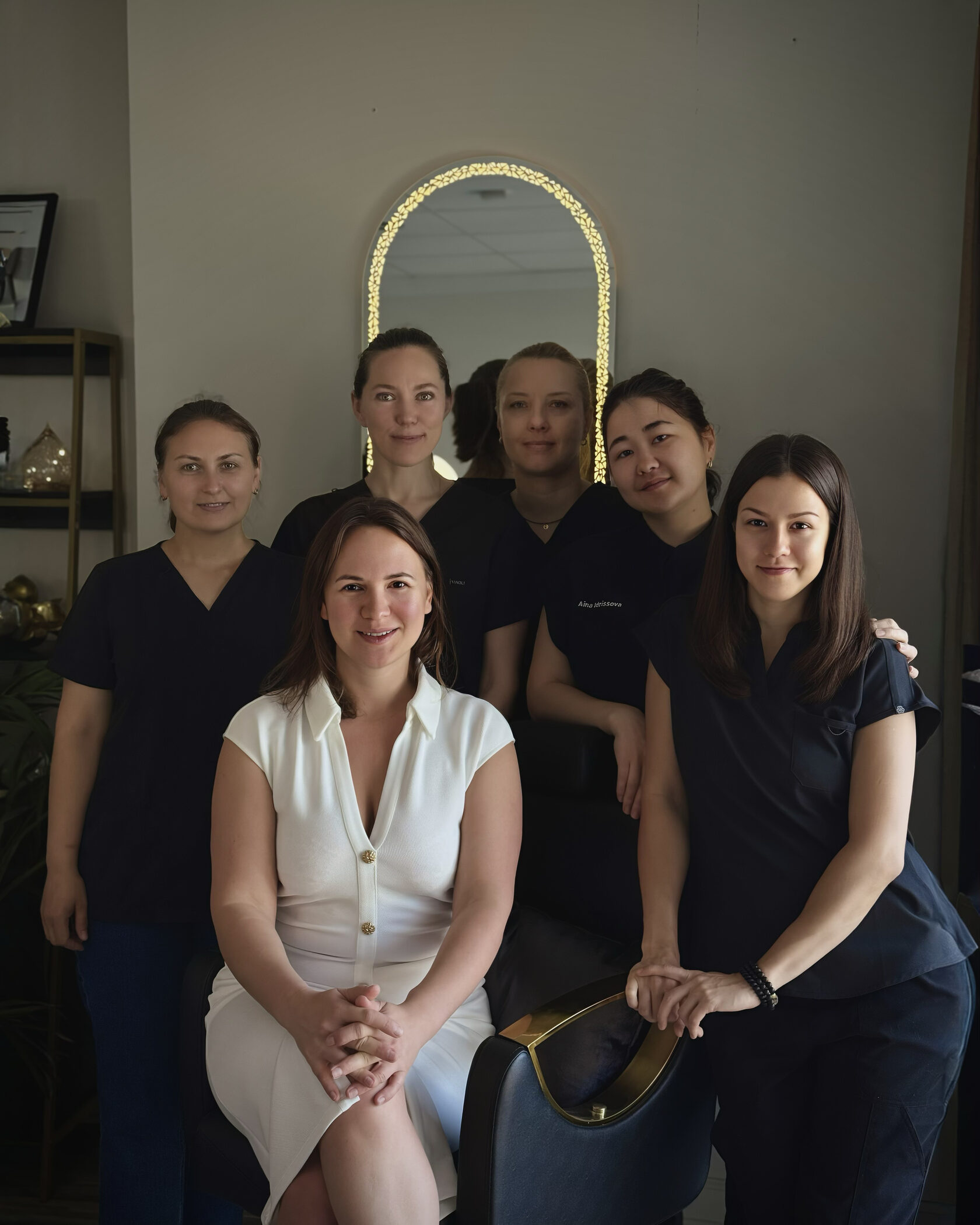Face Bliss Academy educator with a group of facial massage students
